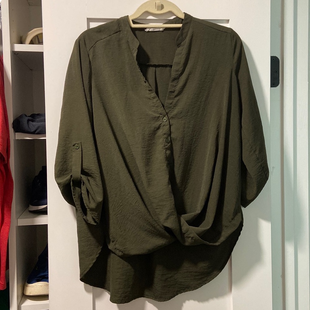 Green size small quarter arm length top.